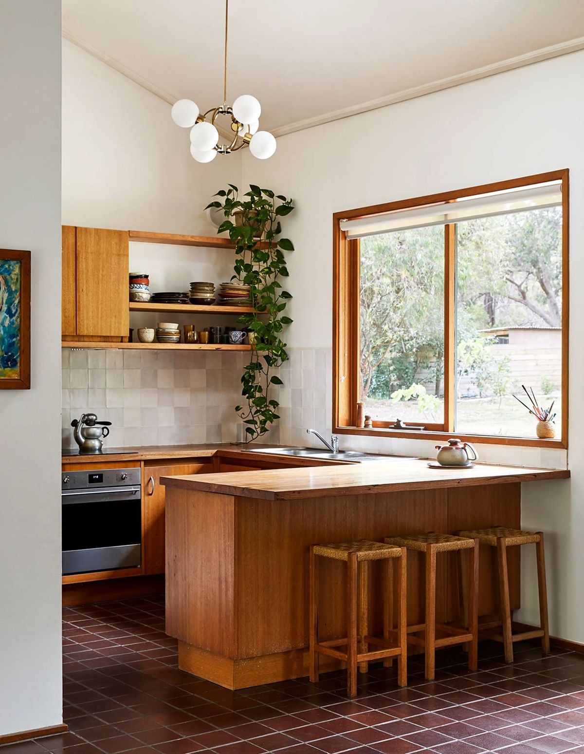 Mid-Century home with large expanses of glass opening onto the garden